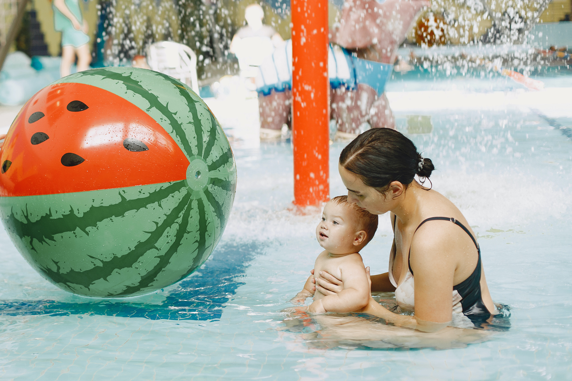 A mother and her baby in the waterpark in Cape Coral