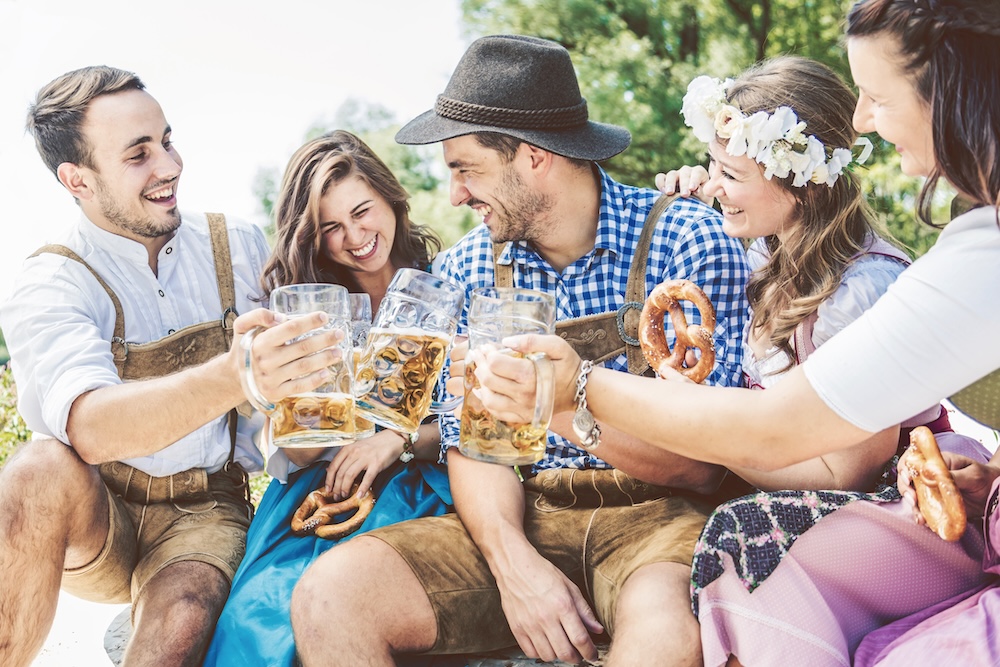 friends enjoy a drink at Oktoberfest